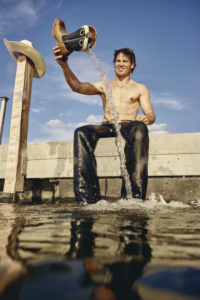 Surfing in Texas Bull riders water sports Wake surfing Texas Clayton Sellers Najiah Knight Rodeo life What's Your Rush campaign Ariat