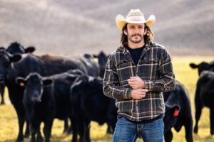 Triston in an urban backdrop, showcasing their modern and trendy look for commercial modeling.